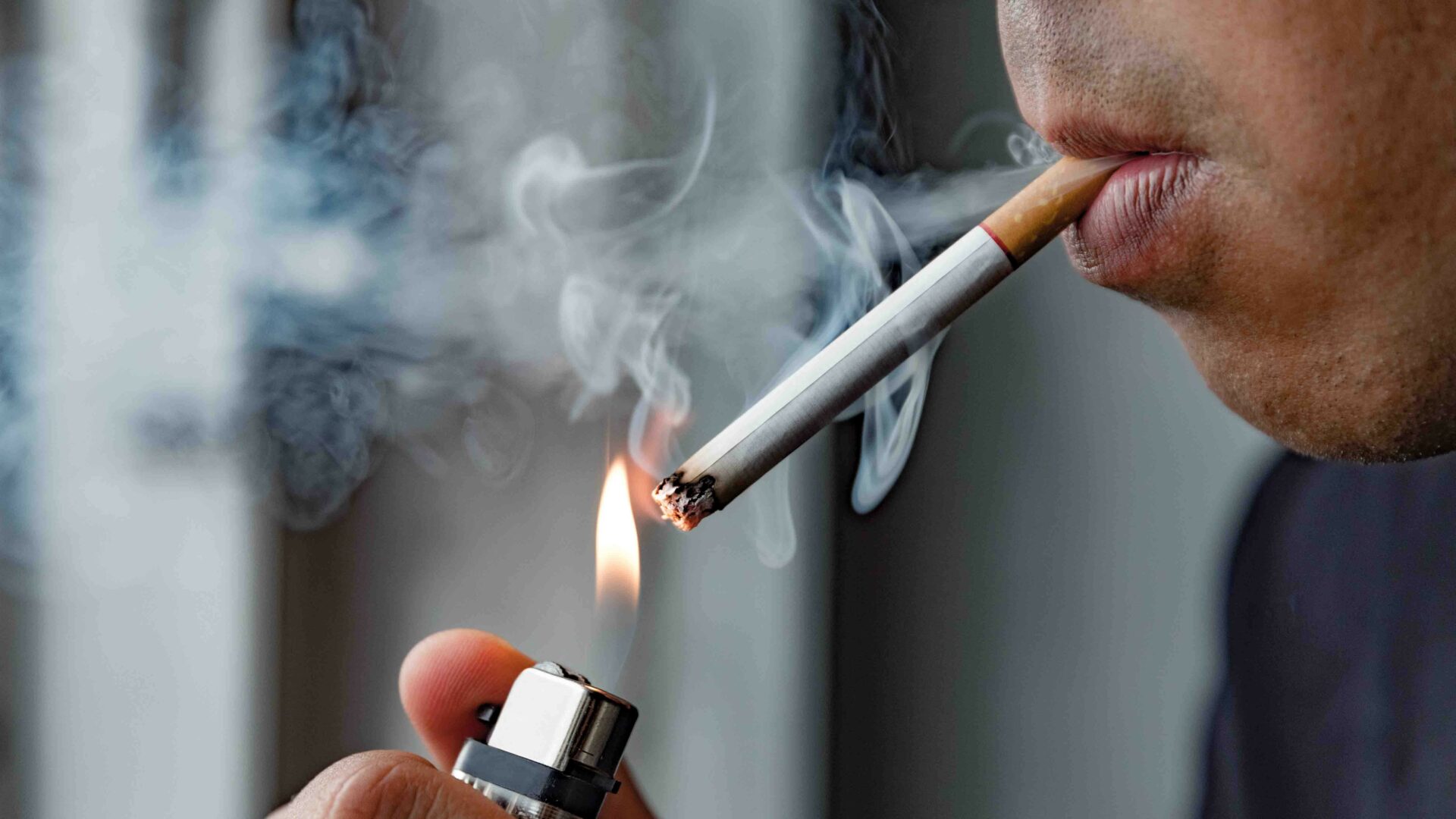 Close,Up,Young,Man,Smoking,A,Cigarette.