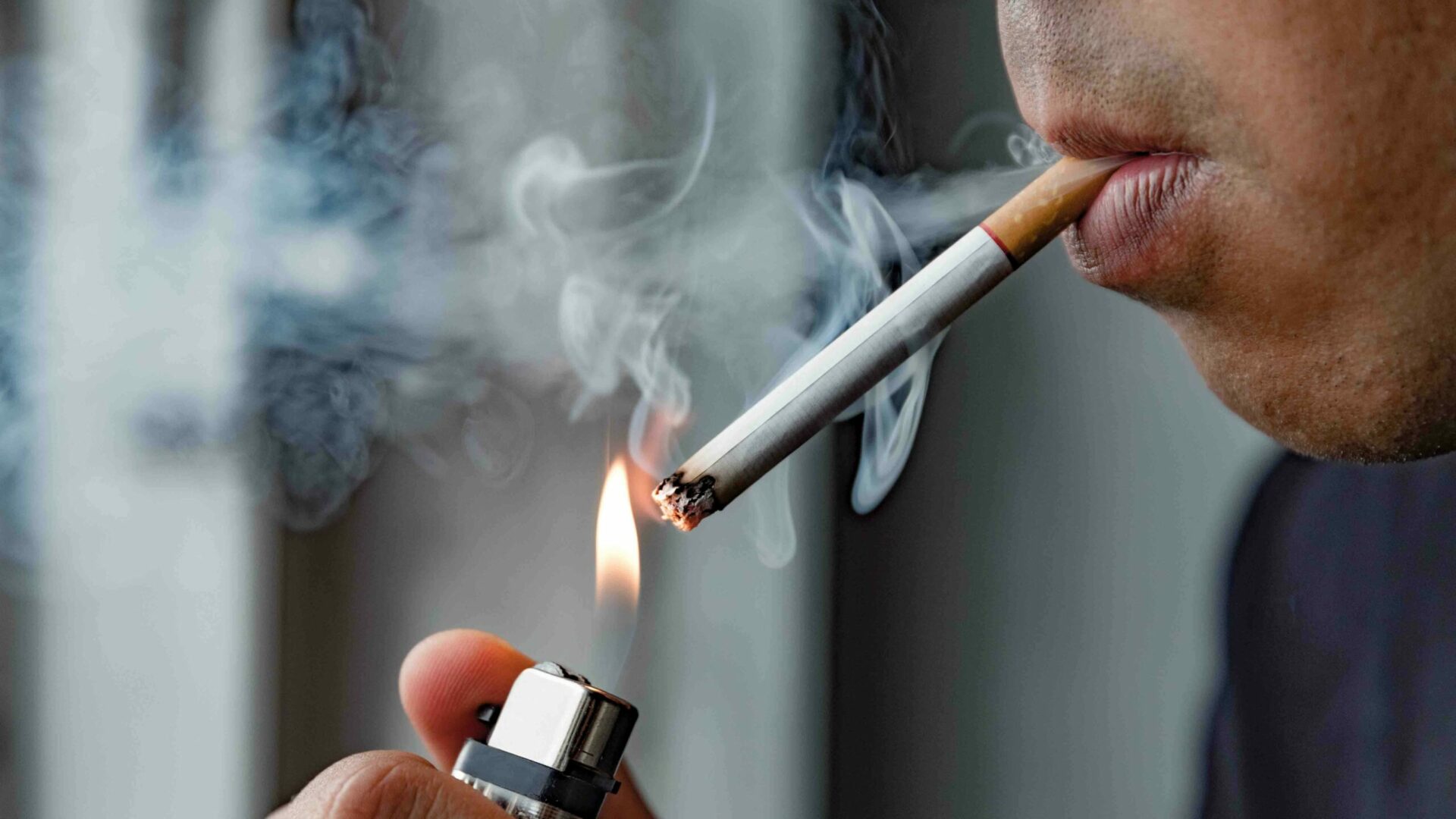Close,Up,Young,Man,Smoking,A,Cigarette.