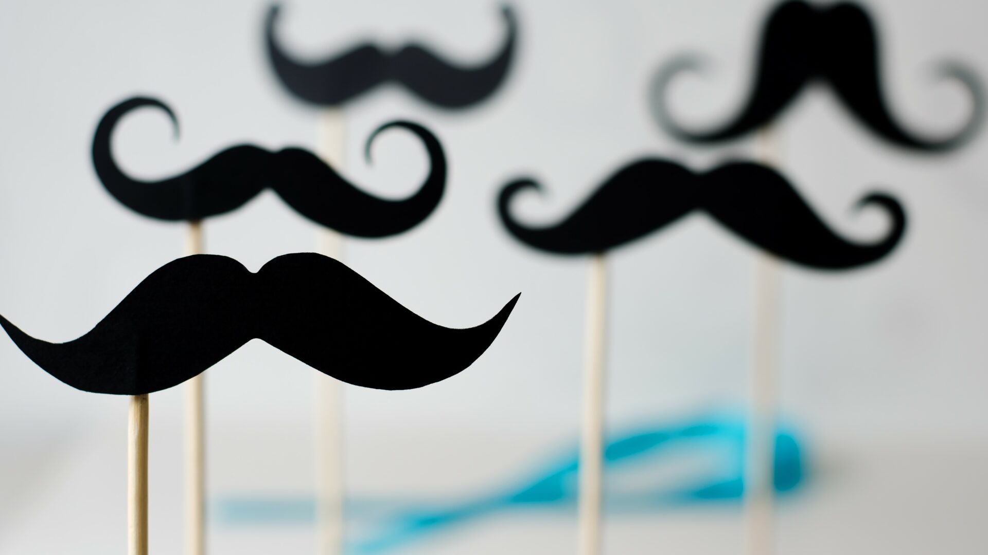 A,Lot,Of,Black,Paper,Moustaches,On,Sticks.,Modern,Masculinity